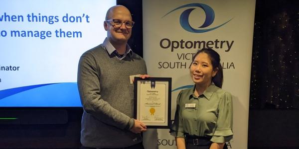 Samuel Dent receives Deakin Student award from Lyn Hsieh