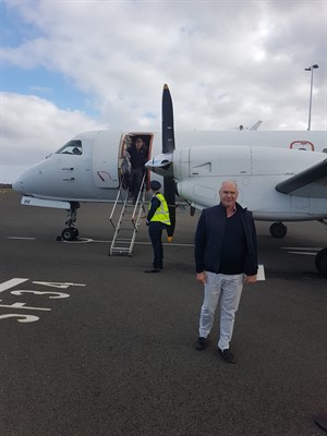 Dion arriving on plane